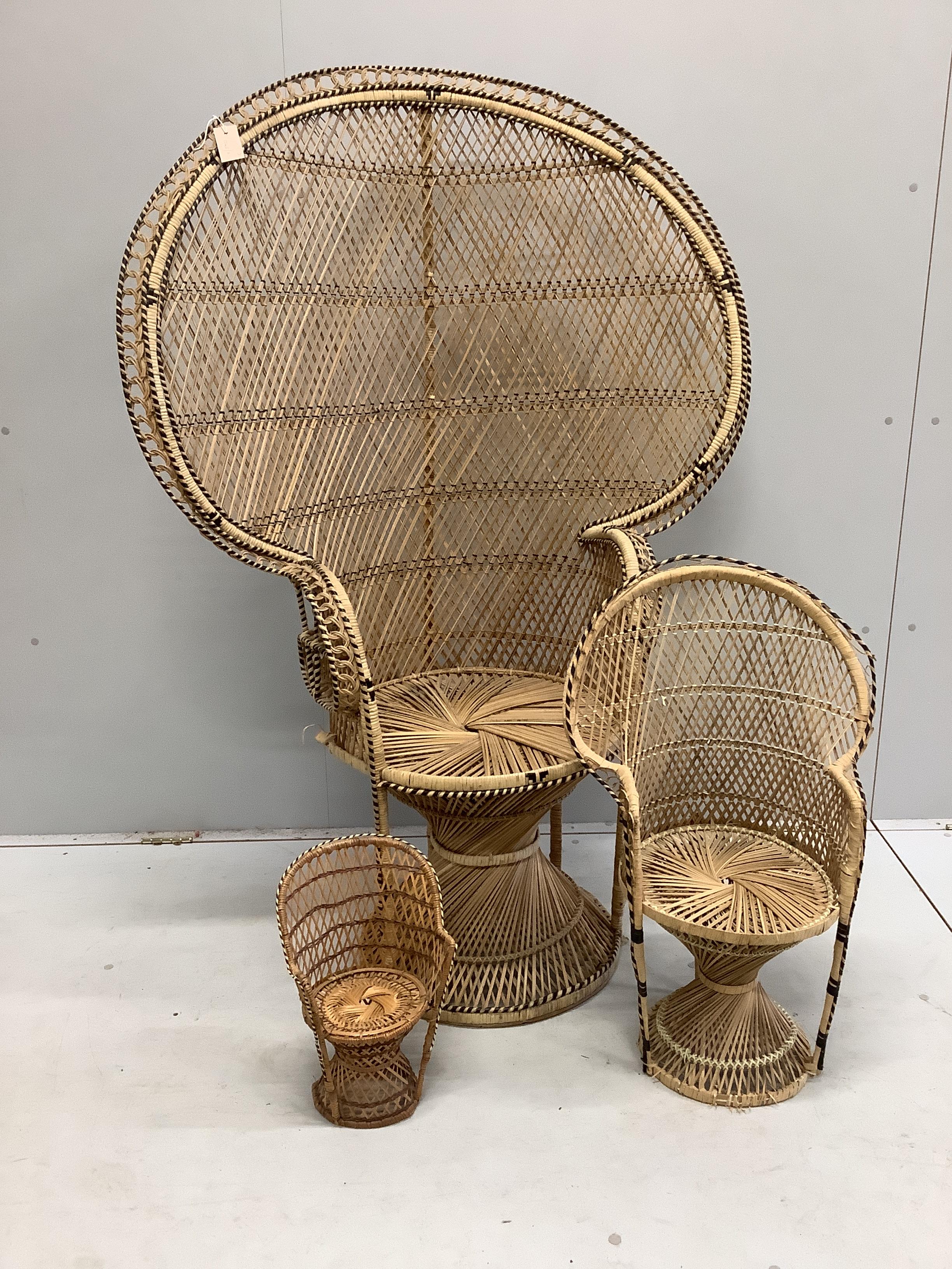 Three graduated 'peacock' chairs